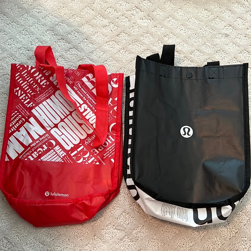 Red and white and black and white lululemon small tote bags